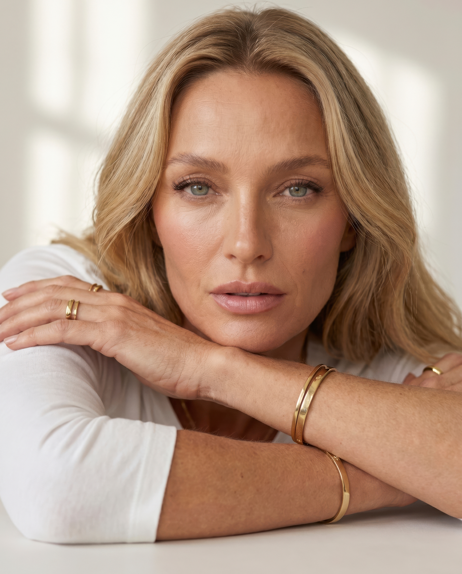 Editorial portrait of a poised woman with natural, refined features